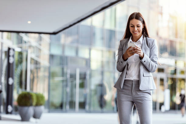 Making big plans on her cellphone