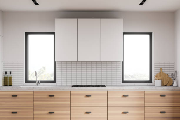 istock White kitchen with wooden countertop 1259895519