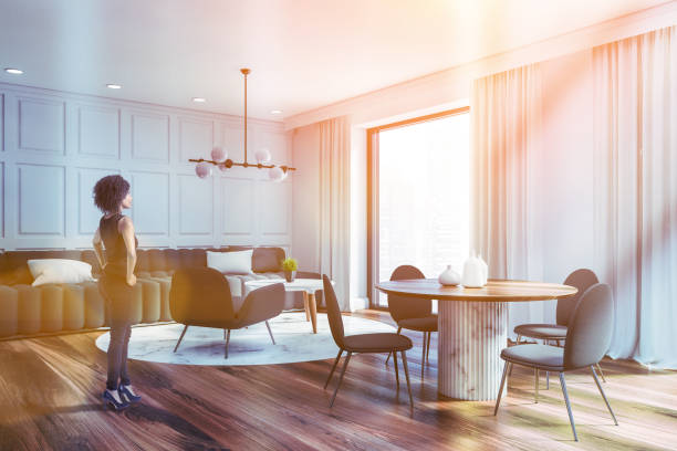istock African woman in white dining room 1259897142