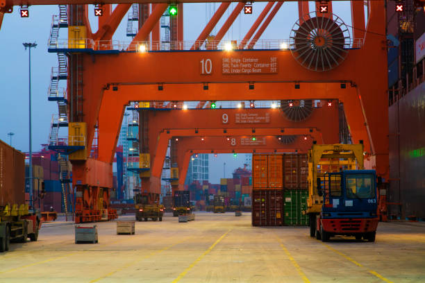 Shenzhen, Guangdong, China, June 21, 2024: Close-up photo of Shekou Container Terminal, taken from the hanging window of a vessel, which is located in Shenzhen Bay, Nanshan District, Shenzhen, and is one of the important cargo terminals in the Guangdong-Hong Kong-Macao Greater Bay Area.