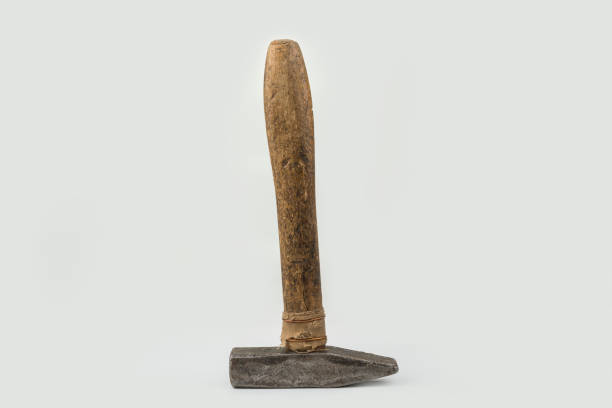 istock Old used hammer on a white background 1259920685