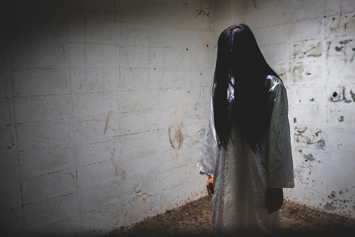 Mysterious Woman, Horror scene of scary ghost woman at the dark corner of old Abandoned building