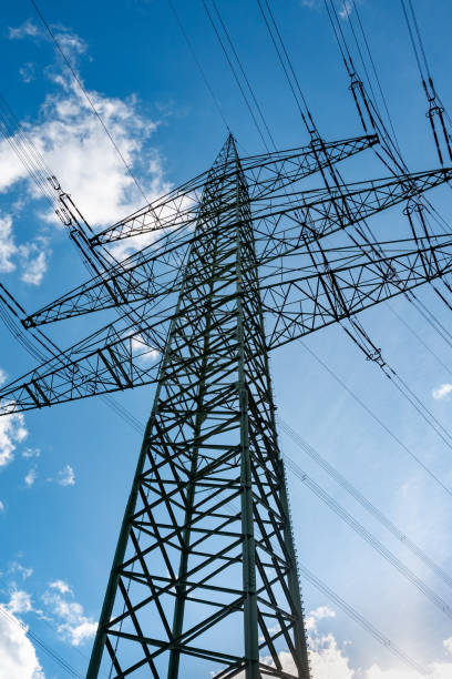istock Power line in front of blue sky 1259925251