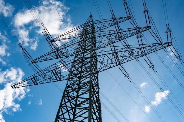 istock Power line in front of blue sky 1259925260