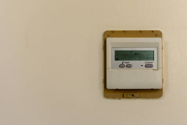 istock Industrial Air conditioner controller on the wall for environmental climate control and business cooling concepts. 1259925309