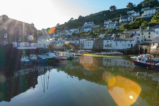 Polperro, Cornwall, England, UK. This is the harbour at sunset .