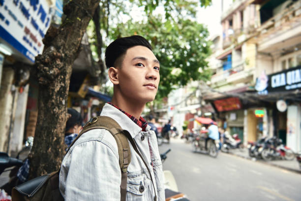 istock Close-Up Of Man Looking Away 1259963850