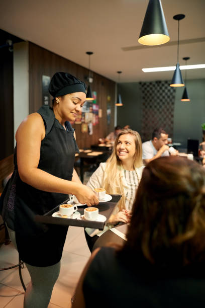 istock Serving fresh coffee to people in a cafe 1259970913
