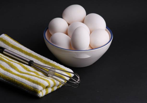 istock chicken eggs on a colored background. Farm products, natural eggs. 1259988982