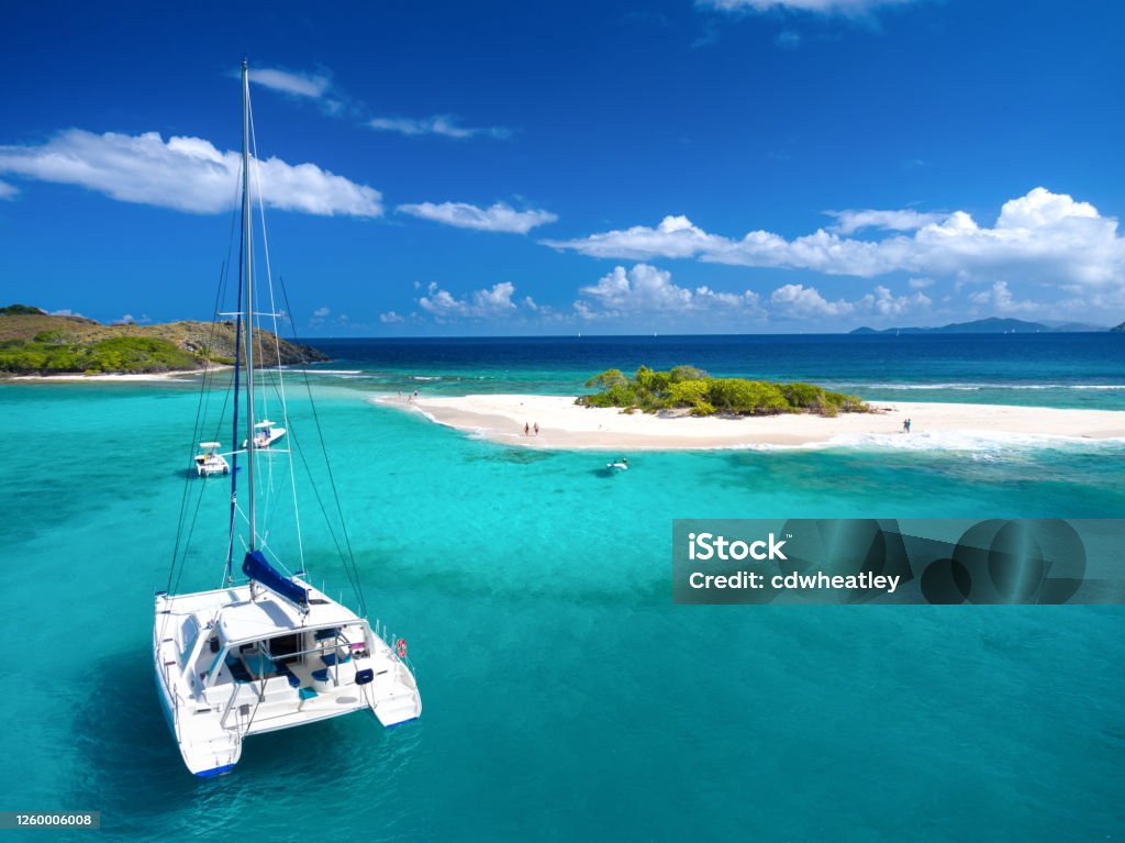 Aerial view of Catamaran at Sandy Spit, British Virgin Islands Aerial view of Catamaran at Sandy Spit, British Virgin Islands, Caribbean Caribbean Stock Photo