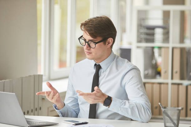 istock Businessman Speaking by Video Call in Office 1260010322