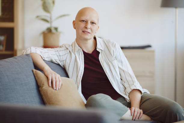 istock Smiling Bald Woman at Home 1260017295