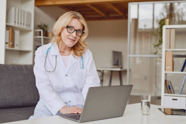 istock Mature Female Doctor in Clinic 1260018421