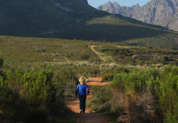 istock A young boy is running on a single track in the mountains 1260026038