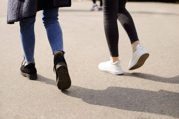 istock Legs of female students going forward 1260036993