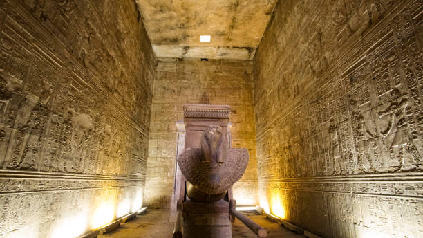 istock Temple of Horus Edfu Egypt interior hieroglyphics room with statue and monument uplight archietcture 1260060430