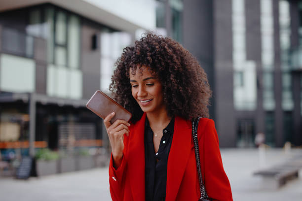 istock Businesswoman recording voice message using her smartphone 1260070023