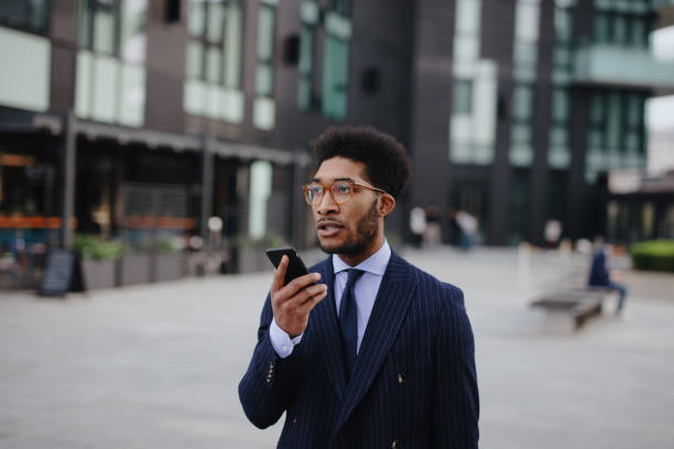 istock Businessman recording voice message using his smartphone 1260072206