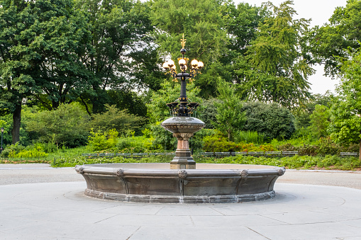 A view of a water fountain in the park