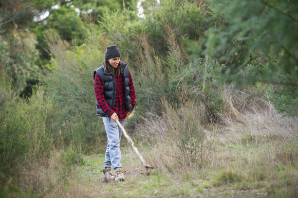 istock Australian Teenager Camping by the Fire 1260128358