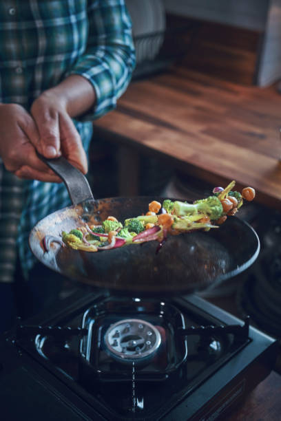 istock Preparing Vegan Pumpkin Pizza with Broccoli, Chickpeas and Spinach 1260149207