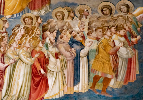 Fresco painted by Giotto. Saints prey looking at God.