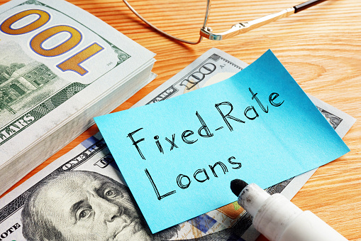 Fixed-Rate Loans is shown on a conceptual business photo