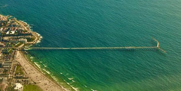 view of ocean beach pier from an embraer 175
