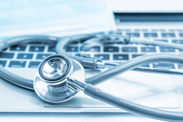istock Medical stethoscope for doctor checkup on laptop 1260213657