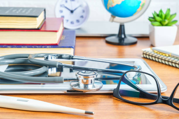 istock Medical stethoscope for doctor checkup on tablet computer 1260214235