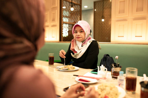 istock happy asian friends having dinner together 1260224613