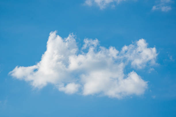 istock White clouds on blue sky background, abstract wallpaper of nature 1260234650