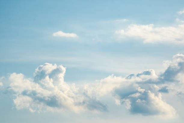 istock White clouds on blue sky background, abstract wallpaper of nature 1260235175