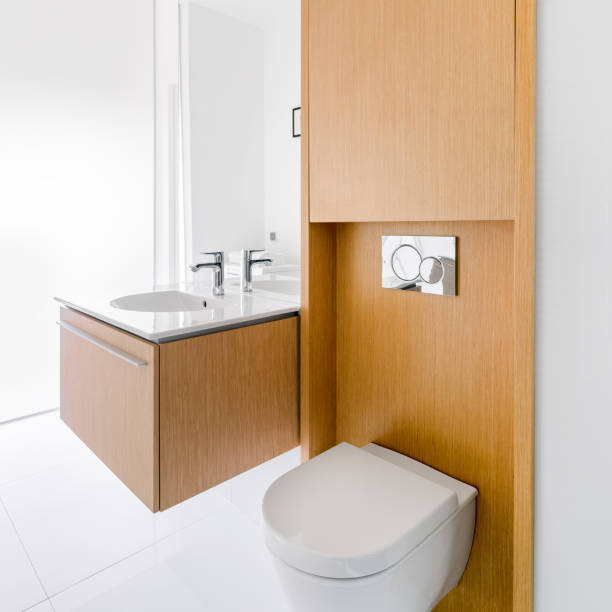 istock White bathroom with wooden wall 1260252942