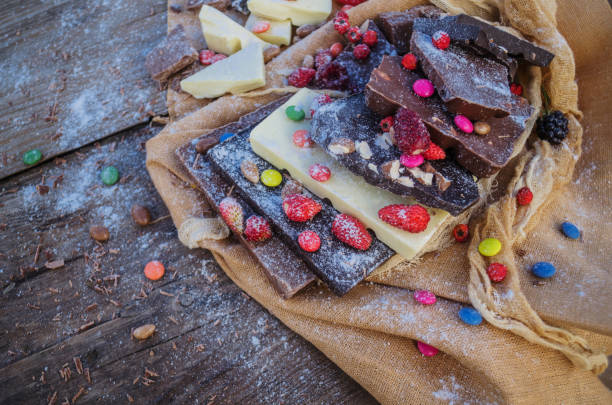 istock Chocolate mix with colorful candy and fruit 1260262689