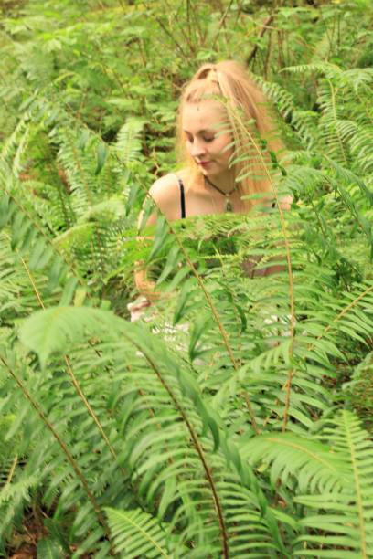 istock Woman in Ferns 1260303865