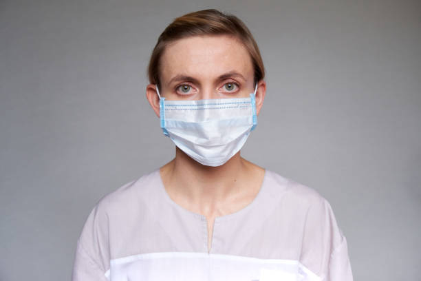 istock Female in medical clothes 1260317825