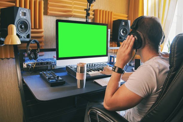 Portrait of a young man working mixing at radio show