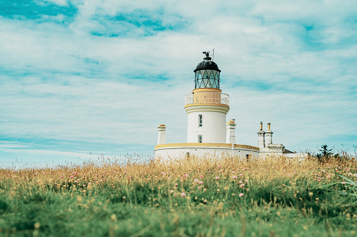 Chanonry Point lighthouse beside the village of Fortrose in Scotland. Built in 1846, it is now a privately owned and the nearby beach is a popular location for observing dolphins.
