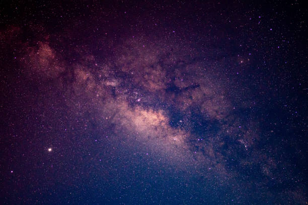 istock Milky way galaxy and starfield on night sky background 1260359858