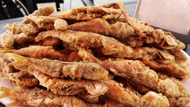 istock Deliciously fried red mullet fish on a plate 1260361524