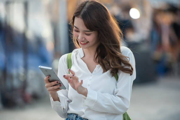 istock Young woman use touch on mobile phone screen. 1260380996