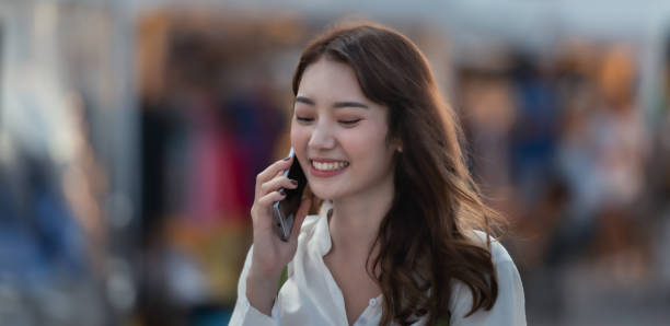 istock Young woman talking on mobile phone. 1260385849