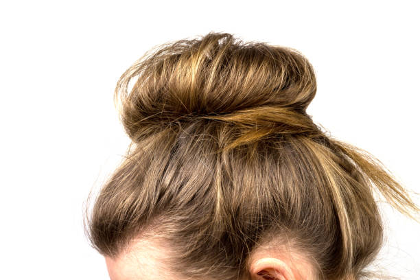 istock Hair tied in a bun 1260386969