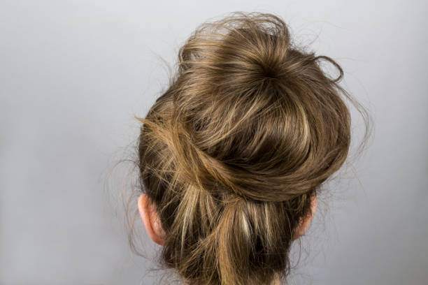 istock Hair tied in a bun 1260387517