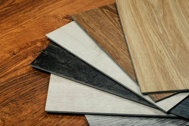 istock Laminate background. Samples of laminate or parquet with a pattern and wood texture for flooring and interior design. Production of wooden floors 1260388126