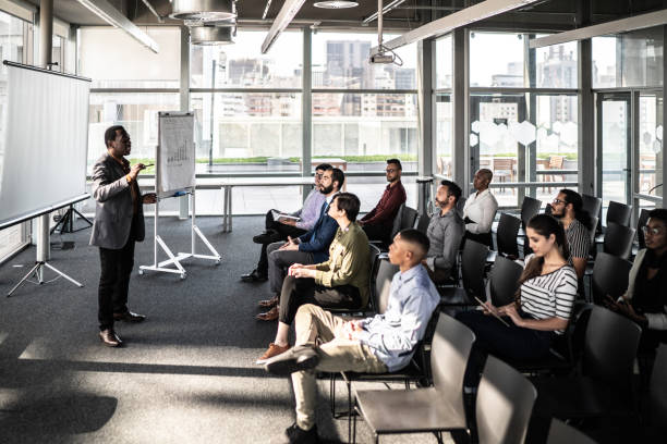 istock Businessman doing a presentation to a team 1260396121