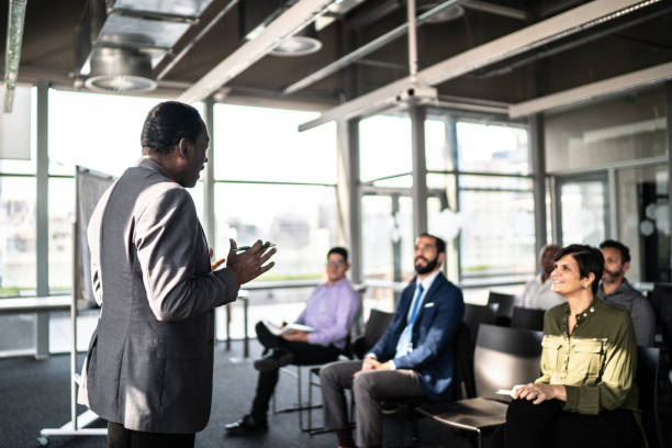 istock Businessman doing a presentation to a team 1260396123