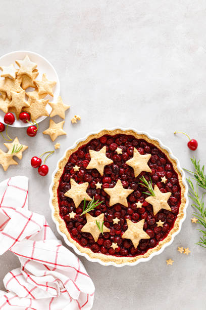 istock Homemade cherry pie, tart with star shaped cookies 1260405800