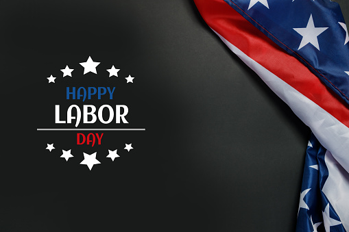 Happy Labor day banner, USA flag on dark background.